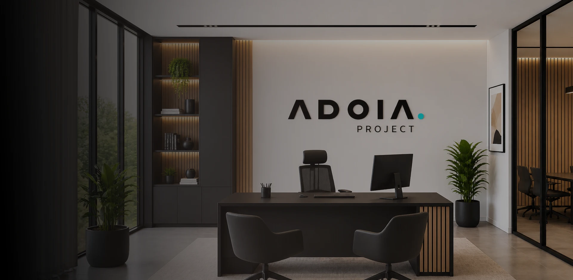 Oficina moderna de ADOIA Project con diseño corporativo y entorno profesional